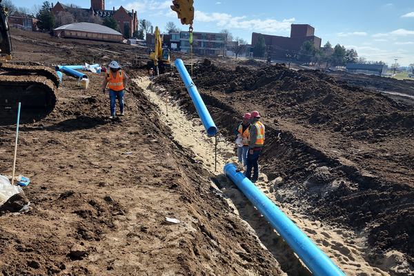 Laying PVC water main to grade